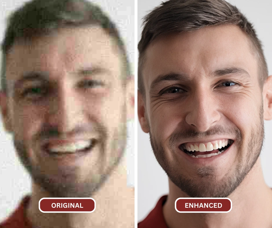 closeup of a man in red polo shirt smiling and has a light stubble